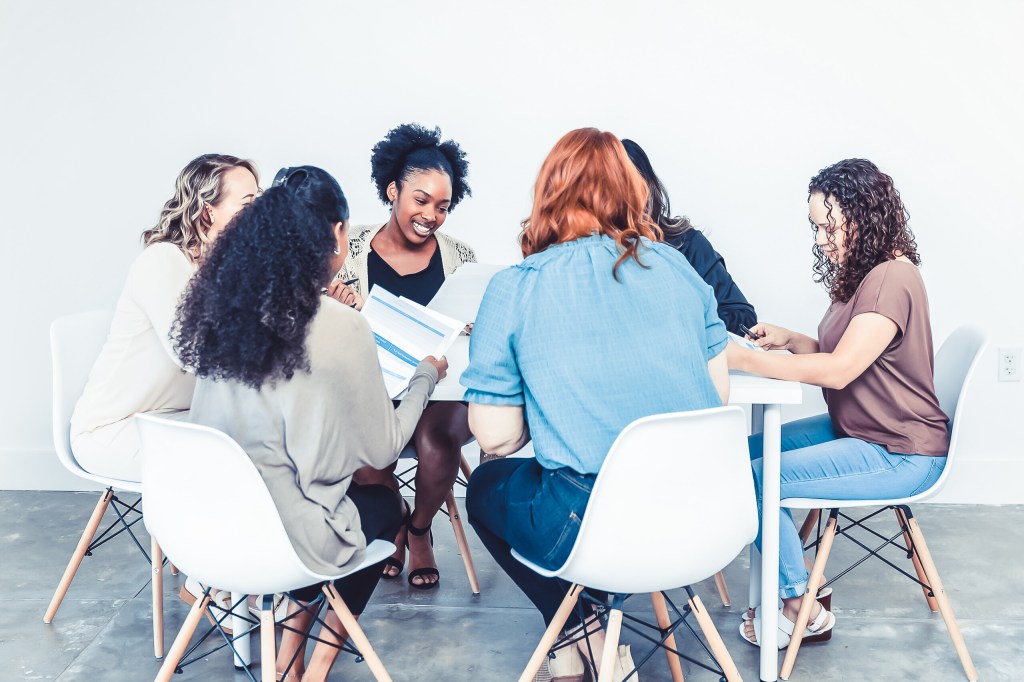 Team connecting and sharing reviews.